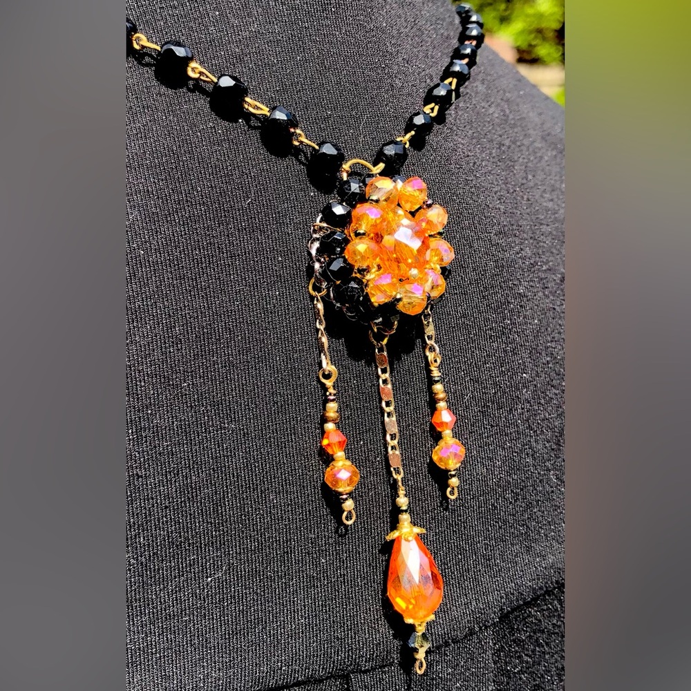 Handcrafted necklace of vivid peach & black vintage beads with dangling charms - Picture 5 of 8